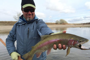 Frank Smethurst with streamer caught rainbow trout
